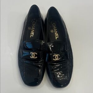 CHANEL Black Patent Loafers with Gold Logo